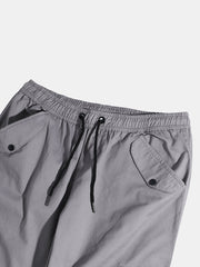Einfarbige Cargohose mit Kordelzug und mittlerer Taille für Herren mit Taschen