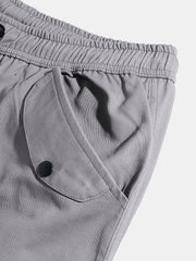 Einfarbige Cargohose mit Kordelzug und mittlerer Taille für Herren mit Taschen