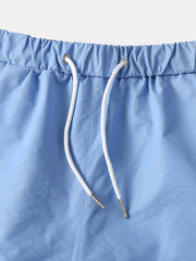 Schnelltrocknende Strand- und Joggingshorts für Herren in einfarbiger Ausführung mit Kordelzug – leichte Activewear