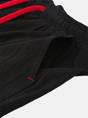 Einfarbige Freizeitshorts für Herren mit elastischem Bund und Kordelzug - bequem und stilvoll