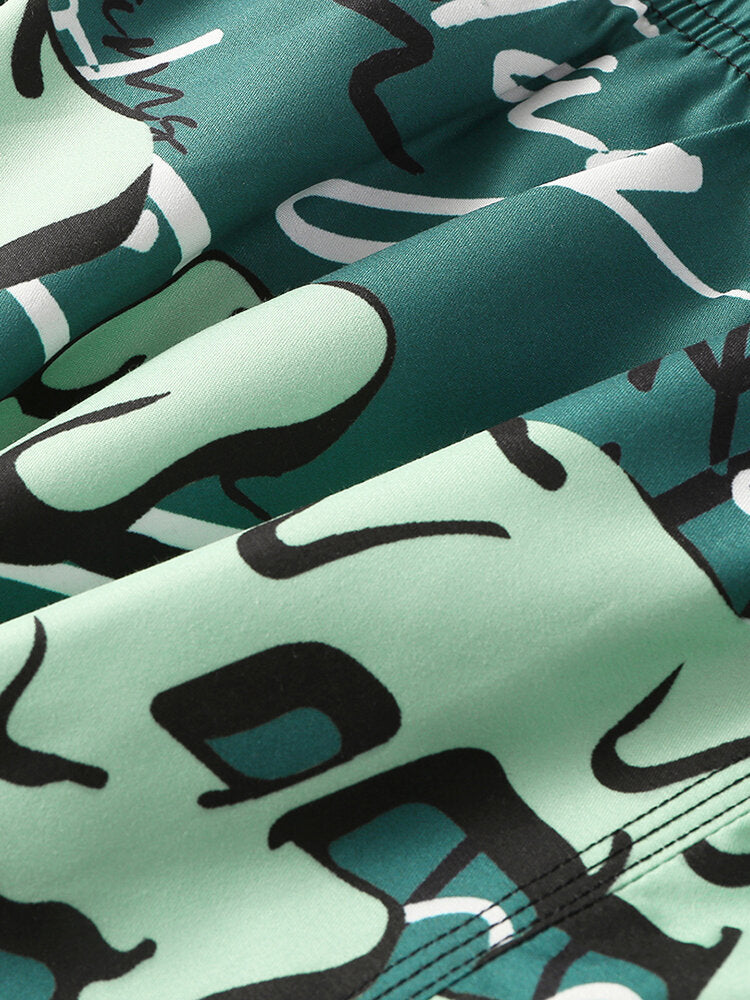 Schnelltrocknende Boardshorts für Herren mit lustigem Graffiti-Print und Netzfutter, lässiger Urlaubs-Shorts