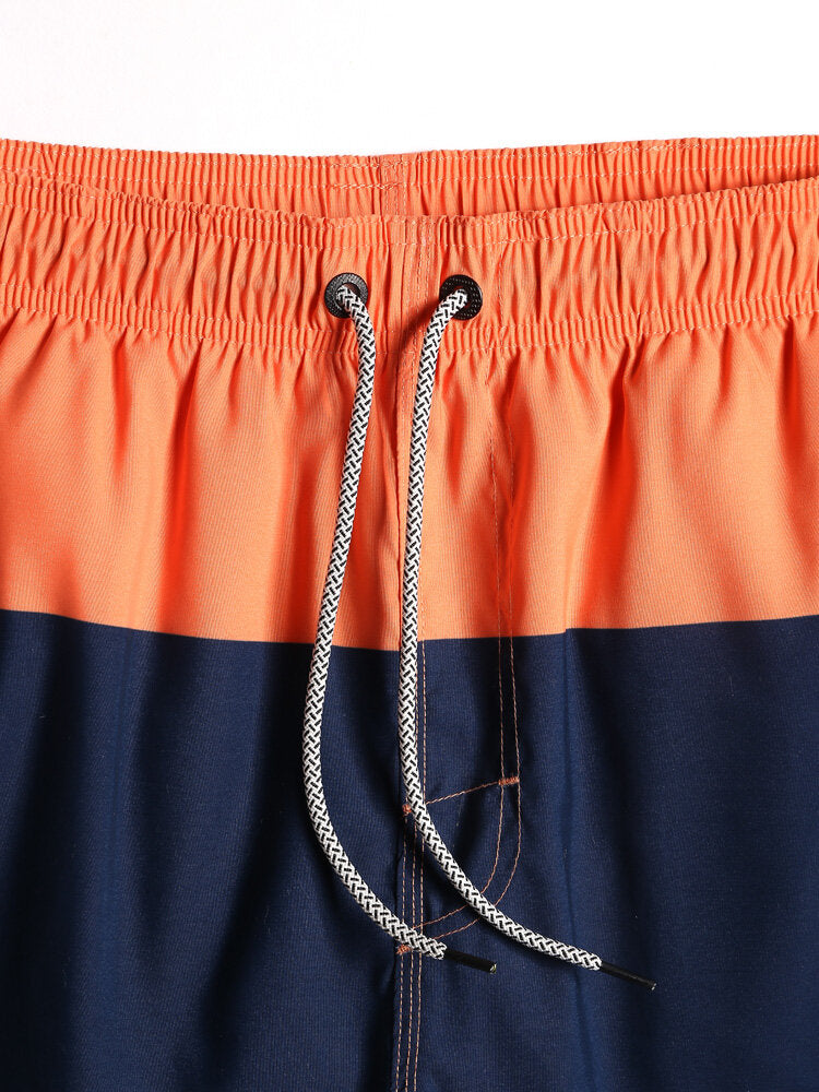 Schnelltrocknende Strandshorts im Farbblockdesign mit Kordelzug in der Taille für Herren