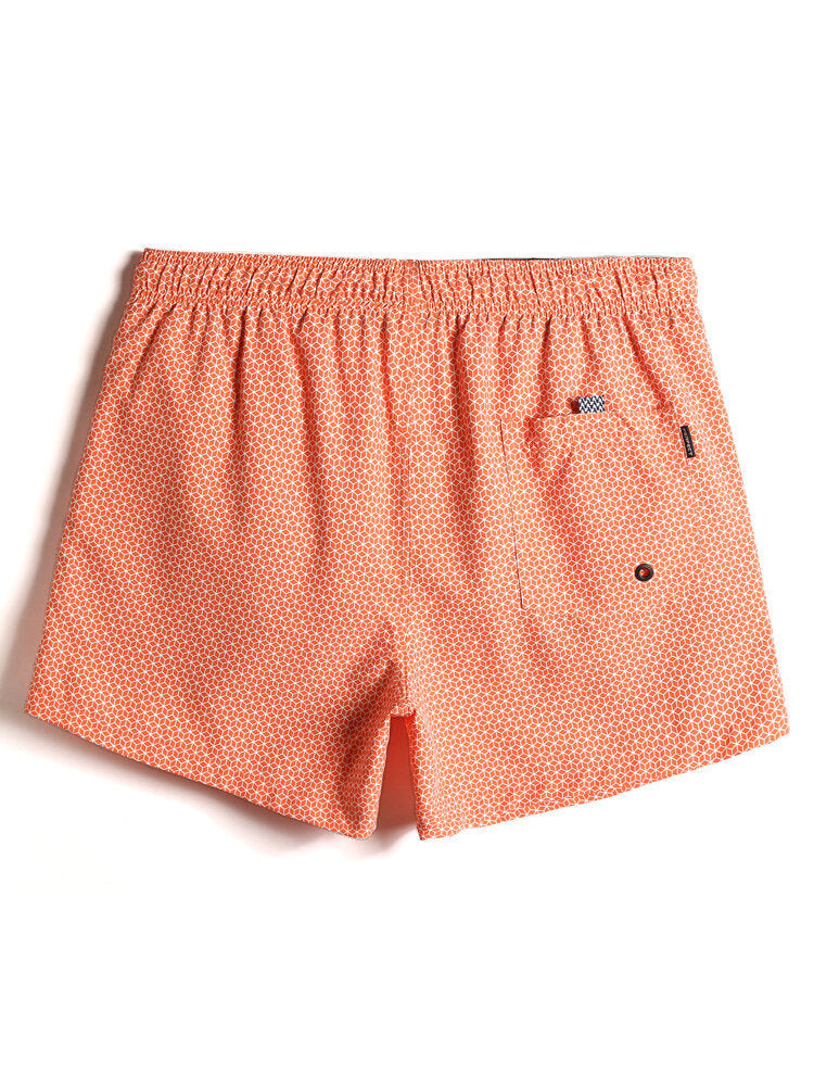 Schnelltrocknende Strandshorts mit Geo-Print und Kordelzug für Herren