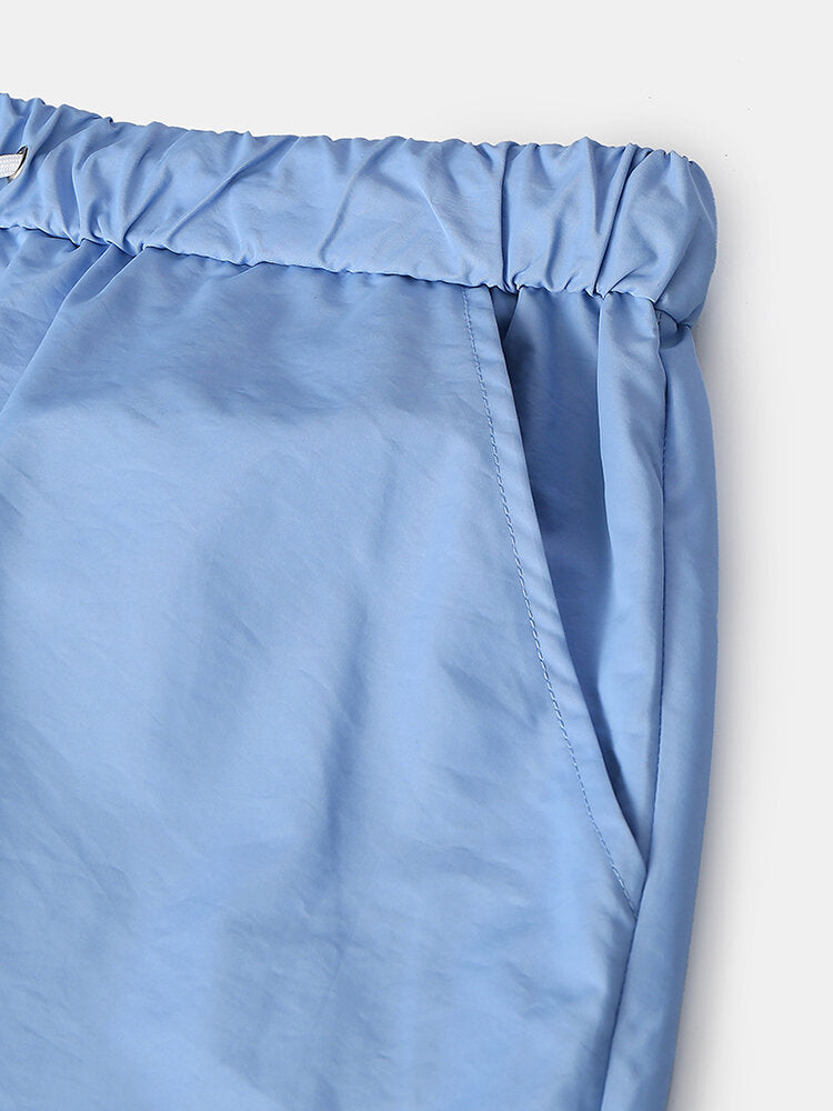 Schnelltrocknende Strand- und Joggingshorts für Herren in einfarbiger Ausführung mit Kordelzug – leichte Activewear