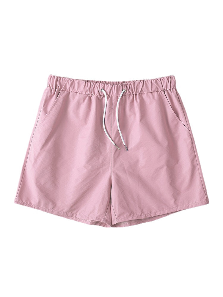 Schnelltrocknende Strand- und Joggingshorts für Herren in einfarbiger Ausführung mit Kordelzug – leichte Activewear