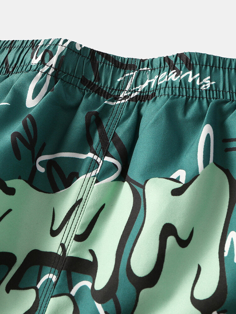 Schnelltrocknende Boardshorts für Herren mit lustigem Graffiti-Print und Netzfutter, lässiger Urlaubs-Shorts